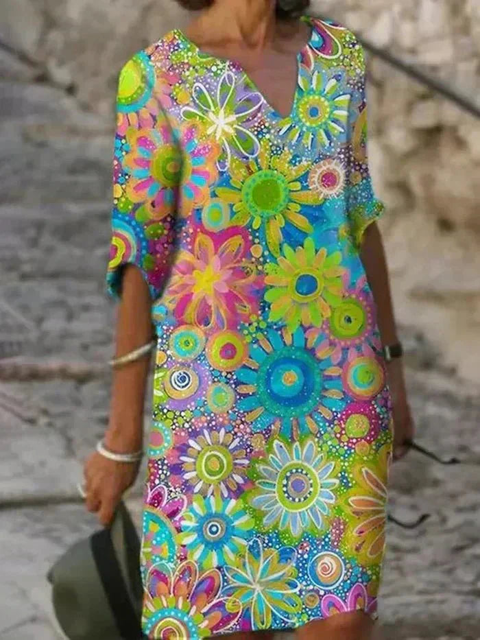 Nira – Robe midi fluide fleurie et élégante